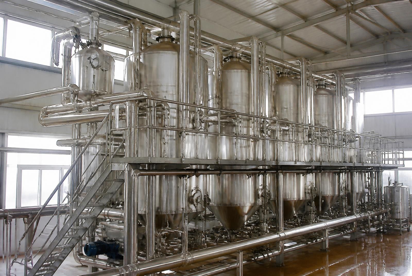 Multi-effect stainless steel tomato paste evaporator with insulated vessels, operator platform and instrumentation